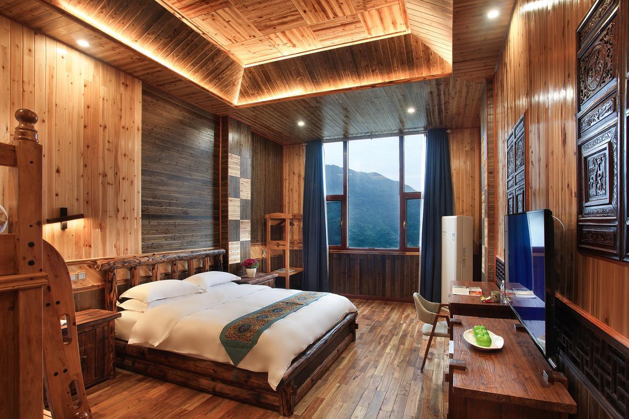 Baike Boutique Hotel Луншэн Экстерьер фото
