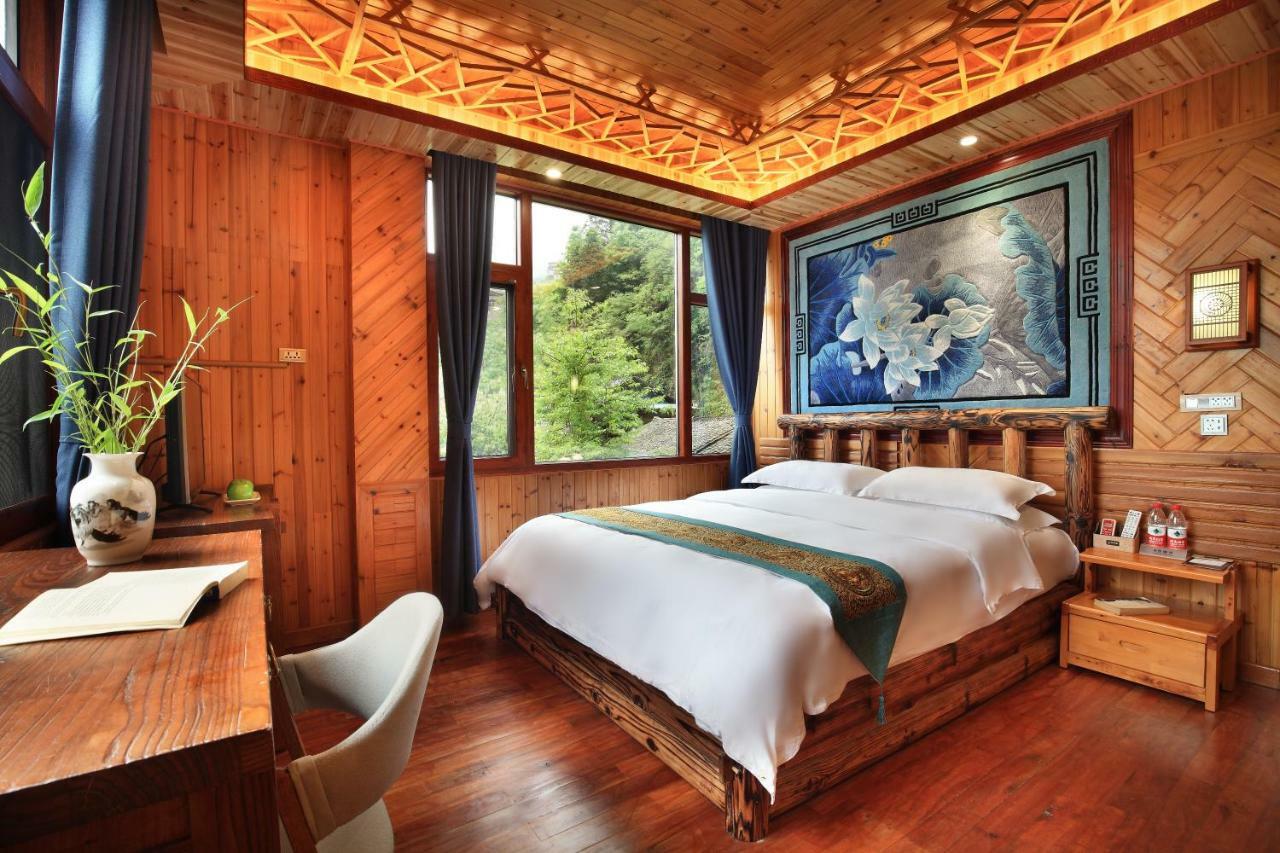 Baike Boutique Hotel Луншэн Экстерьер фото
