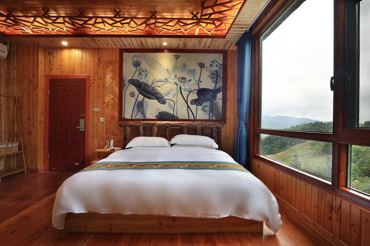 Baike Boutique Hotel Луншэн Экстерьер фото